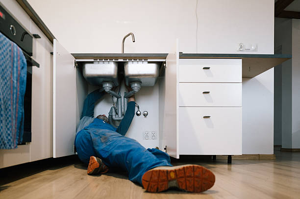 Professional Drain Cleaning technician working in Glengary, WV